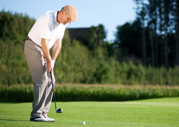 Man playing golf at Hoosier Village