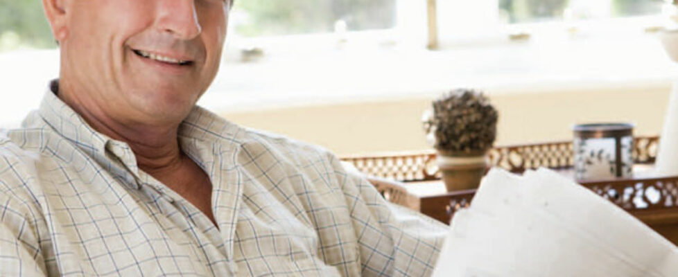 Man reading newspaper