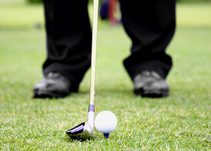 Golf ball on tee Hoosier Village golfing